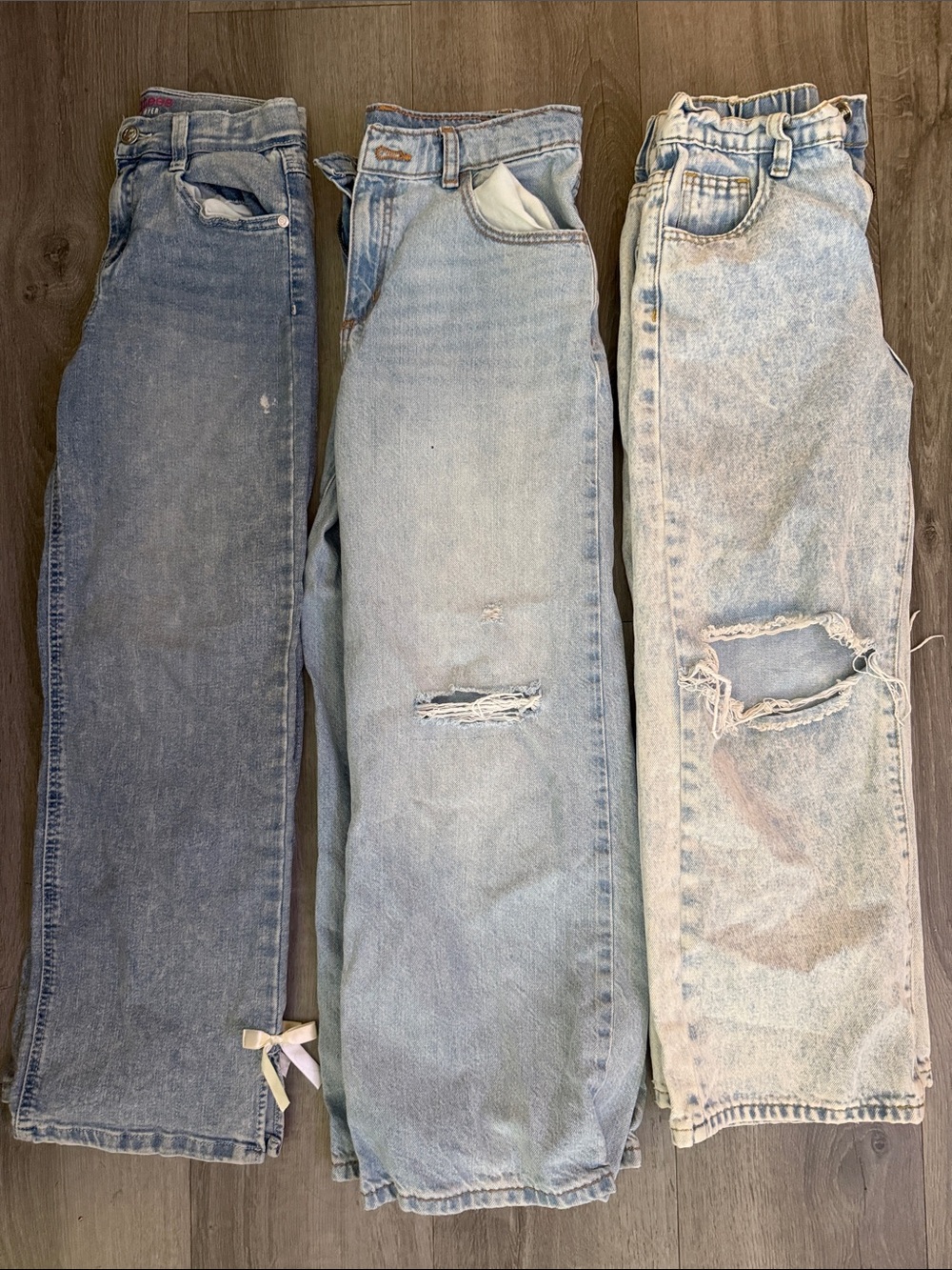 Three Light Wash Denim Jeans - Distressed Styles
